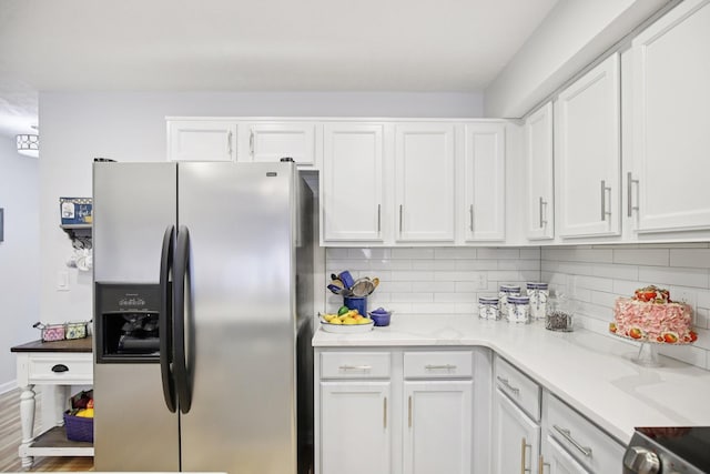 4858 Chelanie Cir, Murfreesboro, TN 37129 - kitchen featuring stainless steel refrigerator with ice dispenser, white cabinetry, tasteful backsplash, and wood finished floors