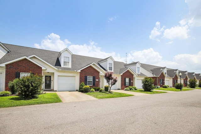 4858 Chelanie Cir, Murfreesboro, TN 37129 - view of front of house with brick siding, concrete driveway, a residential view, a shingled roof, and a front yard