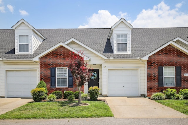4858 Chelanie Cir, Murfreesboro, TN 37129 - view of front of house featuring driveway, a shingled roof, and brick siding