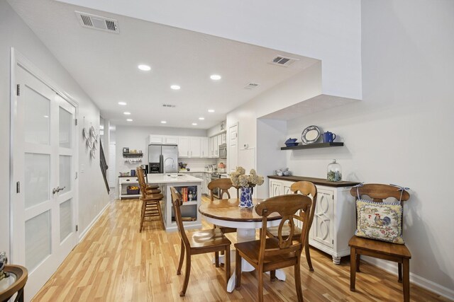 4858 Chelanie Cir, Murfreesboro, TN 37129 - dining space featuring light wood-style flooring and recessed lighting
