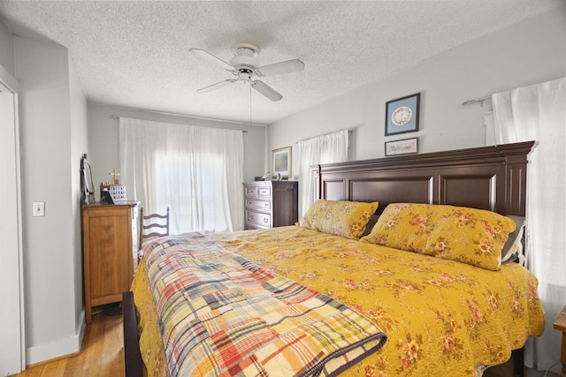 1509 5th Ave W, Springfield, TN 37172 - bedroom featuring light wood finished floors, a textured ceiling, and ceiling fan