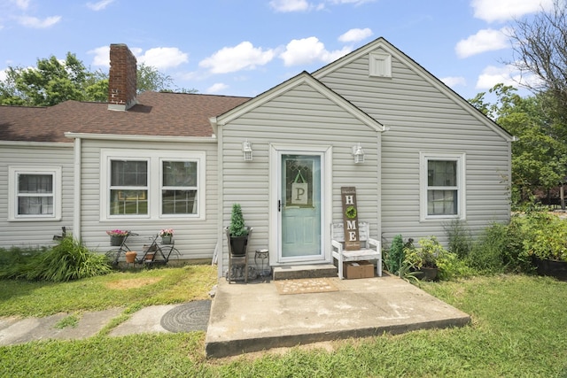 1509 5th Ave W, Springfield, TN 37172 - view of front of home with a front yard and a chimney