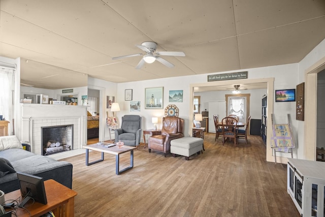1509 5th Ave W, Springfield, TN 37172 - living area with a ceiling fan, wood finished floors, and a fireplace with flush hearth