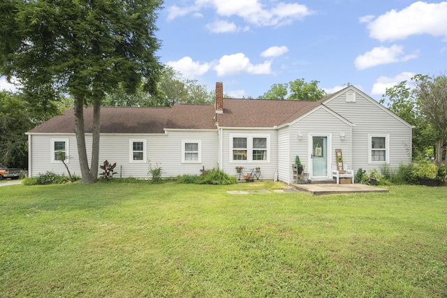 1509 5th Ave W, Springfield, TN 37172 - rear view of house with a chimney, a lawn, and roof with shingles