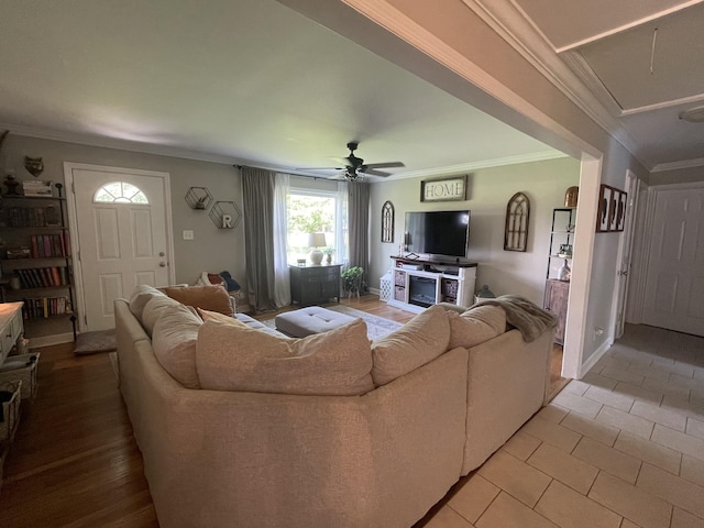64 Mcdougal Rd, Fayetteville, TN 37334 - living room featuring attic access, a ceiling fan, ornamental molding, and light tile patterned floors
