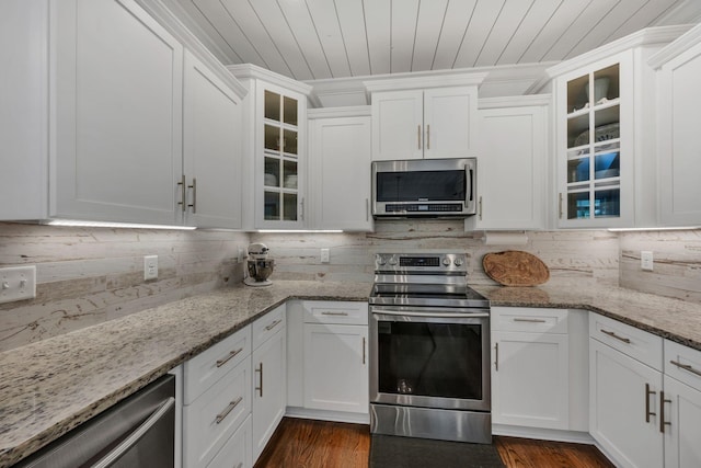 7106 Pepper Tree Cir, Fairview, TN 37062 - kitchen with appliances with stainless steel finishes, backsplash, white cabinets, and wood ceiling