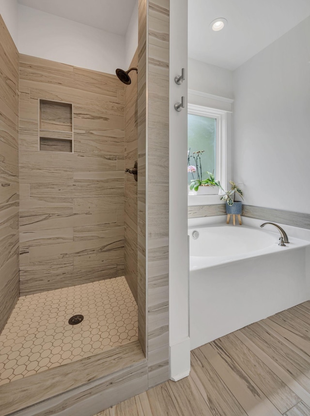 7106 Pepper Tree Cir, Fairview, TN 37062 - full bathroom with a garden tub, a shower stall, and recessed lighting