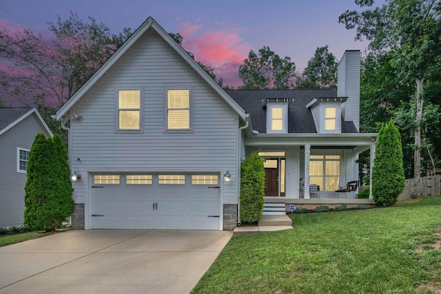 7106 Pepper Tree Cir, Fairview, TN 37062 - view of front of property featuring covered porch, an attached garage, a chimney, concrete driveway, and roof with shingles