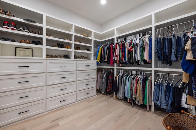 9409 Clovercroft Rd, Franklin, TN 37067 - walk in closet with light wood finished floors