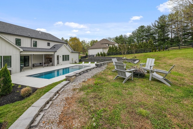 9409 Clovercroft Rd, Franklin, TN 37067 - view of swimming pool featuring a fire pit, a patio area, and a fenced backyard