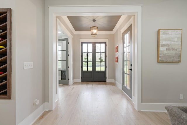 9409 Clovercroft Rd, Franklin, TN 37067 - foyer entrance with french doors and light wood finished floors