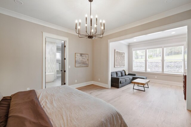 9409 Clovercroft Rd, Franklin, TN 37067 - bedroom featuring a chandelier, crown molding, light wood finished floors, and ensuite bath