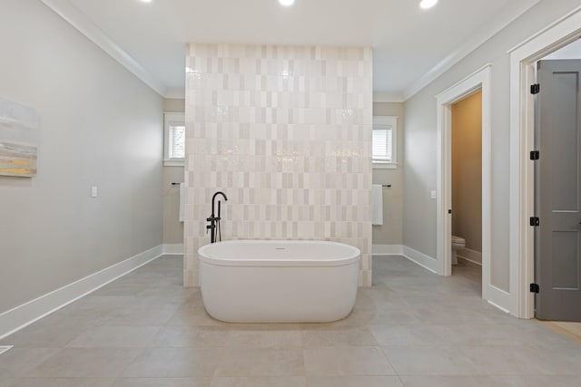 9409 Clovercroft Rd, Franklin, TN 37067 - full bath featuring ornamental molding, a freestanding bath, tile patterned floors, recessed lighting, and tile walls