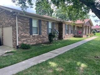1246 Imperial Dr, Columbia, TN 38401 - single story home featuring a front lawn and an attached garage