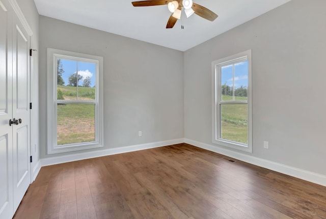 1268 S Tidwell Rd, Bon Aqua, TN 37025 - unfurnished room with wood-type flooring and ceiling fan