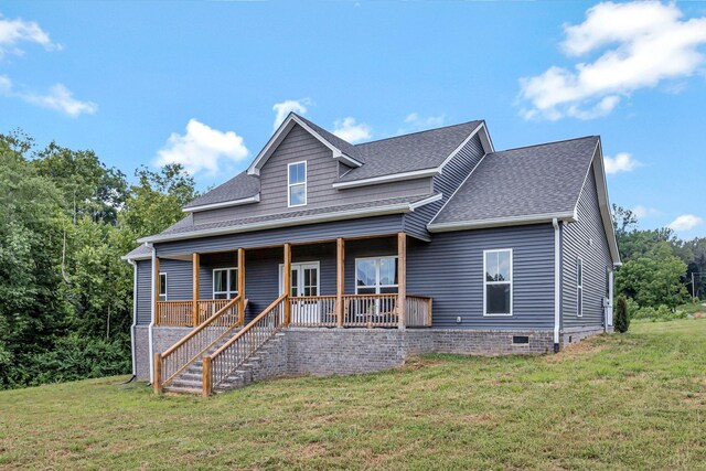 1268 S Tidwell Rd, Bon Aqua, TN 37025 - view of front of property featuring roof with shingles, a front yard, a porch, crawl space, and stairway