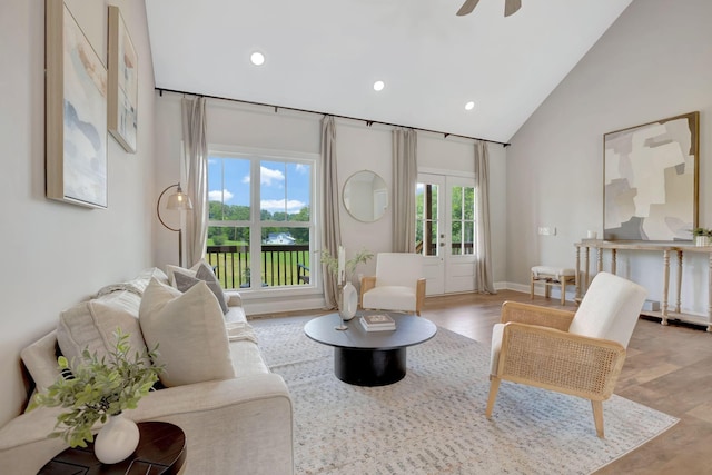 1268 S Tidwell Rd, Bon Aqua, TN 37025 - living area featuring french doors, recessed lighting, light wood finished floors, ceiling fan, and high vaulted ceiling