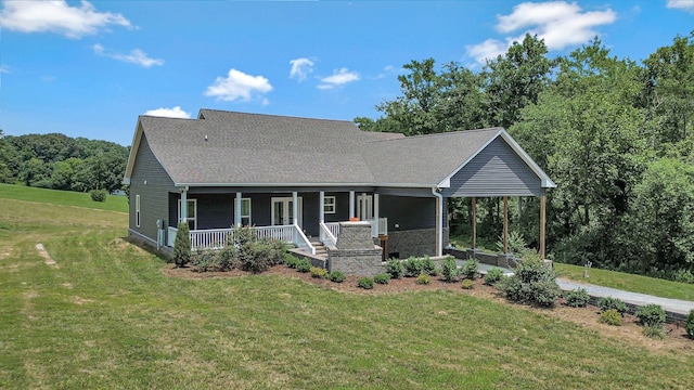 1268 S Tidwell Rd, Bon Aqua, TN 37025 - view of front of house with a porch, a front yard, and a shingled roof