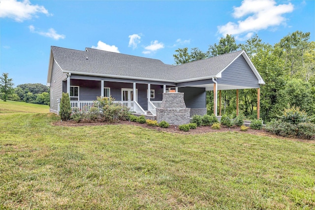 1268 S Tidwell Rd, Bon Aqua, TN 37025 - view of front facade featuring a front lawn, a shingled roof, and covered porch