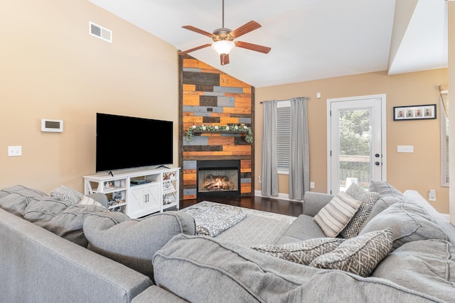 128 Thomas Traylor Ln, Clarksville, TN 37043 - living area featuring lofted ceiling, ceiling fan, wood finished floors, and a large fireplace