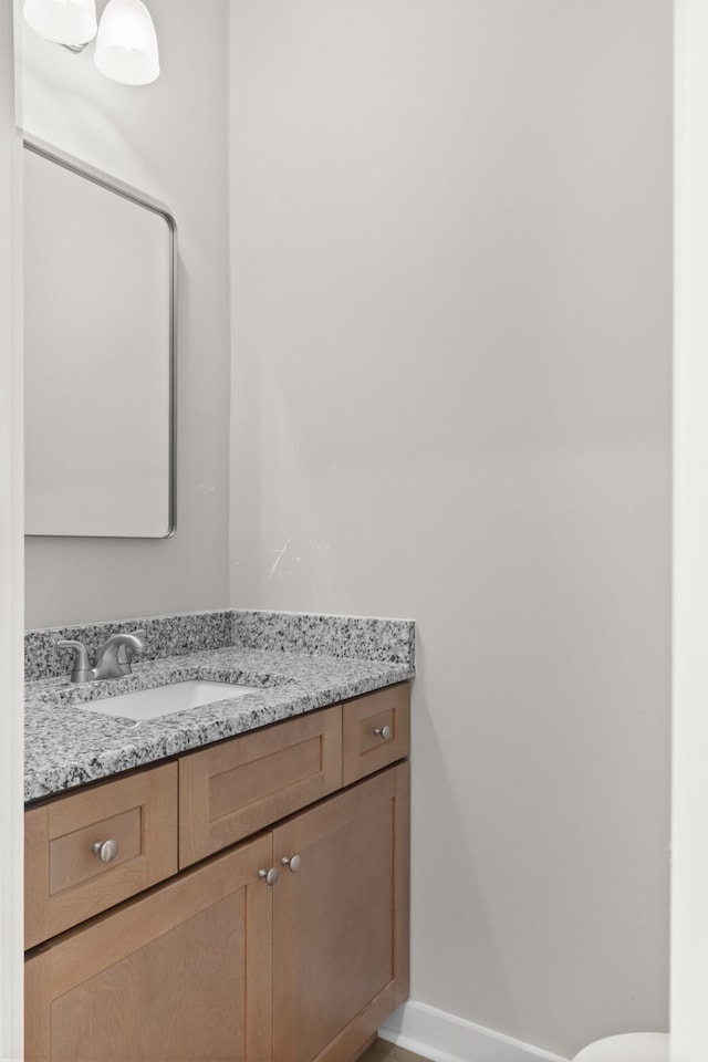 415 9th St, Clarksville, TN 37040 - half bathroom featuring vanity and baseboards