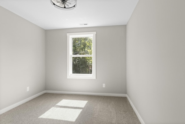 415 9th St, Clarksville, TN 37040 - spare room featuring carpet and baseboards
