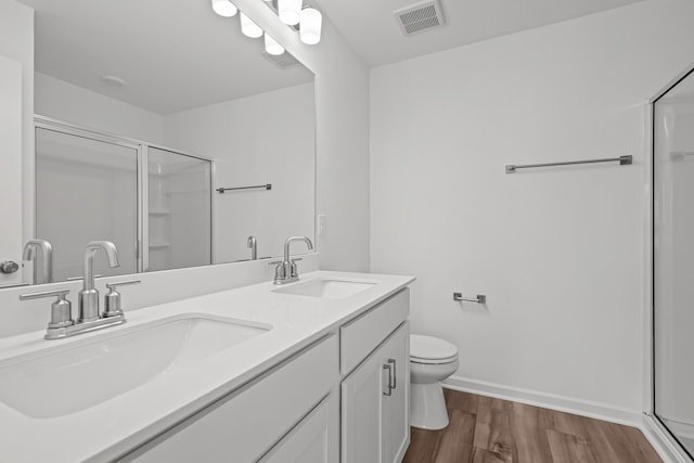 2900 Suzanne Landon Dr Unit E2, Murfreesboro, TN 37130 - full bath featuring a shower stall, wood finished floors, and double vanity