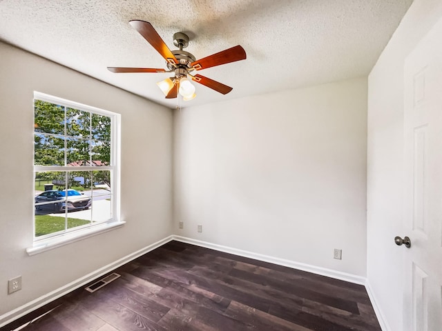 1333 Meredith Way, Clarksville, TN 37042 - spare room featuring dark wood-type flooring, a ceiling fan, and a textured ceiling