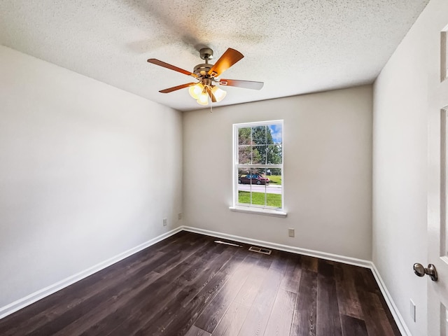 1333 Meredith Way, Clarksville, TN 37042 - empty room with a ceiling fan, dark wood-type flooring, and a textured ceiling