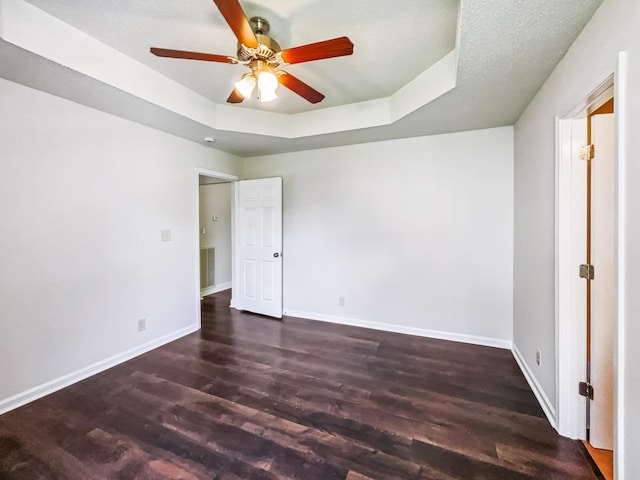1333 Meredith Way, Clarksville, TN 37042 - unfurnished bedroom featuring wood finished floors, a raised ceiling, and a ceiling fan