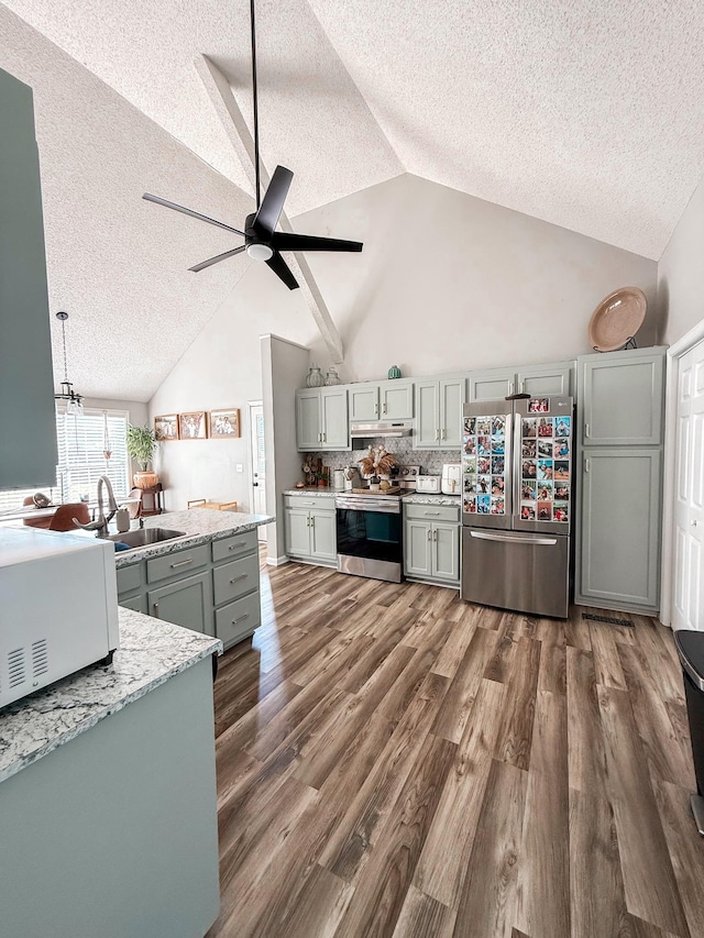 108 Easy St, Pulaski, TN 38478 - kitchen with stainless steel appliances, a textured ceiling, gray cabinetry, under cabinet range hood, and a ceiling fan