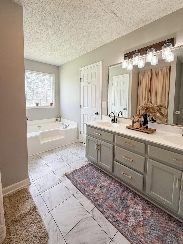 108 Easy St, Pulaski, TN 38478 - full bath featuring double vanity, marble finish flooring, a bath, and a textured ceiling