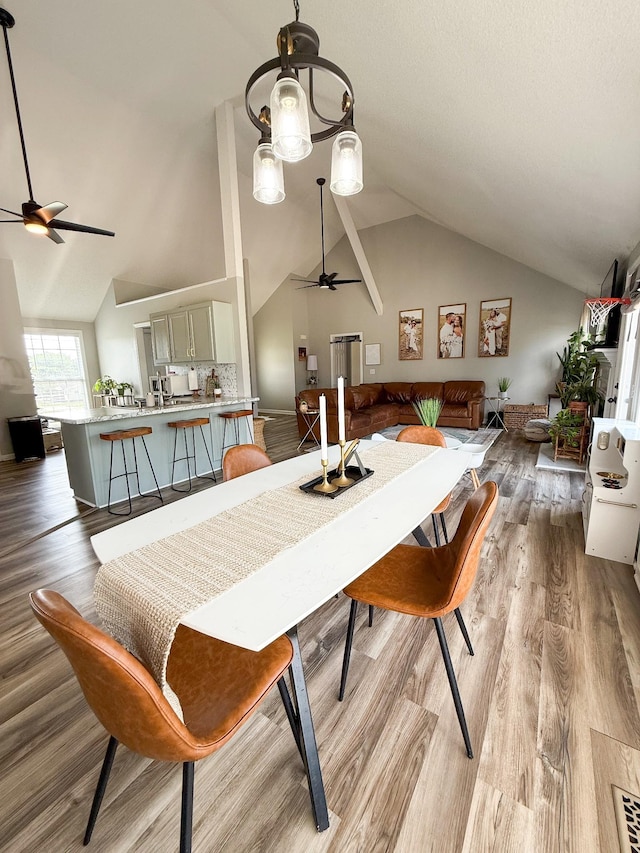 108 Easy St, Pulaski, TN 38478 - dining space with a ceiling fan, vaulted ceiling, and wood finished floors