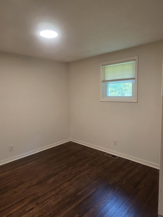 419 Kinsey Blvd, Madison, TN 37115 - unfurnished room with dark wood finished floors and baseboards