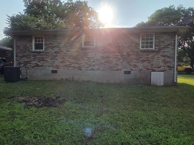 419 Kinsey Blvd, Madison, TN 37115 - view of home's exterior featuring crawl space, a lawn, and brick siding