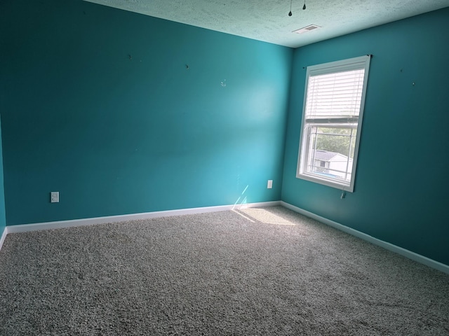1215 Snowball Ln, Clarksville, TN 37042 - unfurnished room featuring a textured ceiling and carpet floors