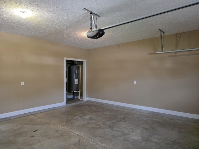 1215 Snowball Ln, Clarksville, TN 37042 - garage featuring a garage door opener and electric water heater