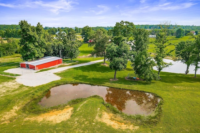 3510 Bybee Branch Rd, Mcminnville, TN 37110 - view of community with an outbuilding, a water view, dirt driveway, and a yard