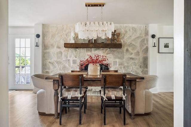 3510 Bybee Branch Rd, Mcminnville, TN 37110 - bar area featuring wood finished floors and a chandelier