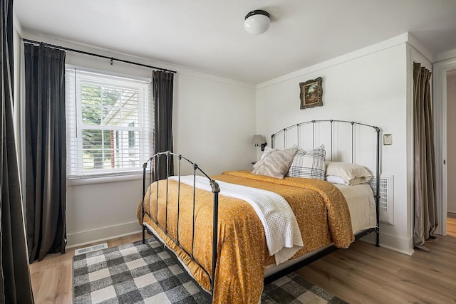 3510 Bybee Branch Rd, Mcminnville, TN 37110 - bedroom featuring wood finished floors and baseboards