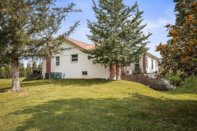3510 Bybee Branch Rd, Mcminnville, TN 37110 - view of side of home with brick siding and a yard