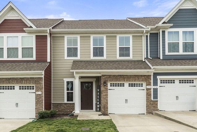 258 Dartmoor Pl, Goodlettsville, TN 37072 - multi unit property featuring stone siding, concrete driveway, roof with shingles, and a garage