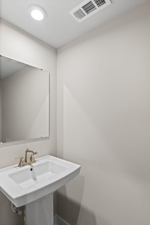 258 Dartmoor Pl, Goodlettsville, TN 37072 - bathroom with a sink and baseboards