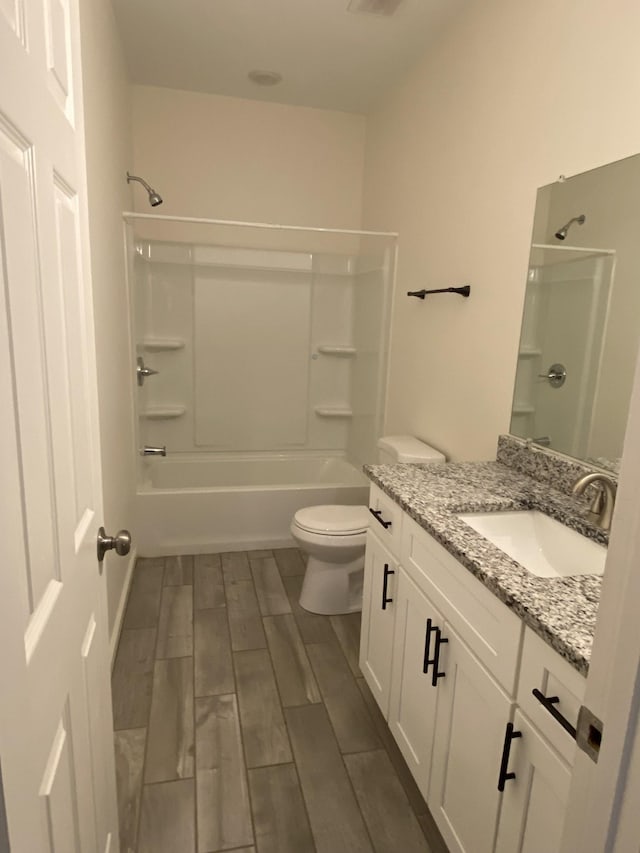 313 Hobbs Ave, Lebanon, TN 37087 - full bathroom featuring vanity, shower / tub combination, and wood finished floors