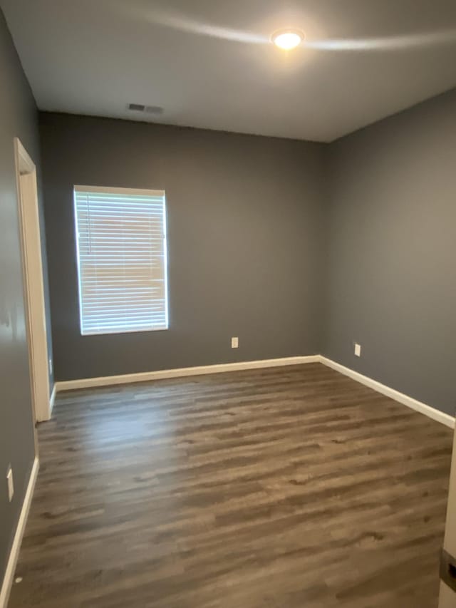 313 Hobbs Ave, Lebanon, TN 37087 - unfurnished room featuring dark wood-style flooring and baseboards