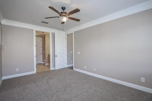 991 Westhaven Blvd Unit 32, Franklin, TN 37064 - unfurnished bedroom with crown molding, carpet floors, and a ceiling fan