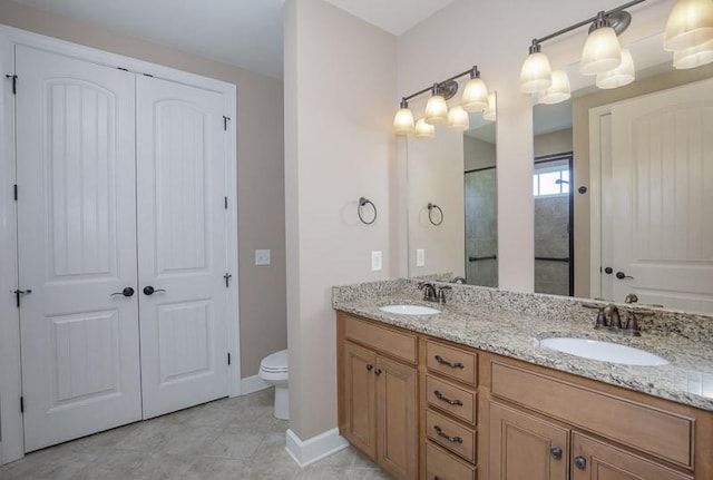 991 Westhaven Blvd Unit 32, Franklin, TN 37064 - bathroom featuring double vanity and tile patterned flooring