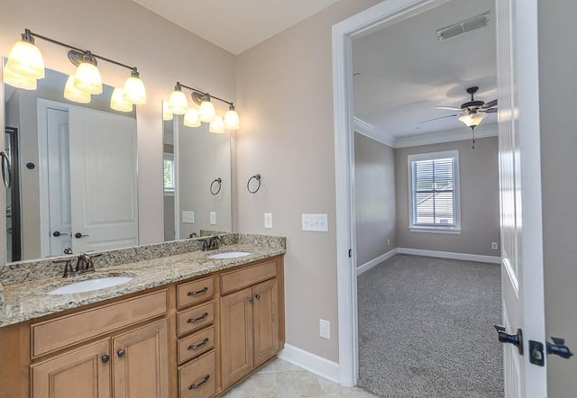 991 Westhaven Blvd Unit 32, Franklin, TN 37064 - full bath with double vanity, ornamental molding, and a ceiling fan