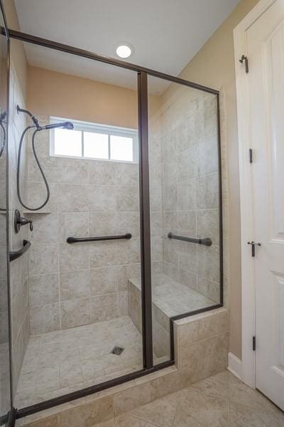 991 Westhaven Blvd Unit 32, Franklin, TN 37064 - bathroom with a shower stall and tile patterned floors