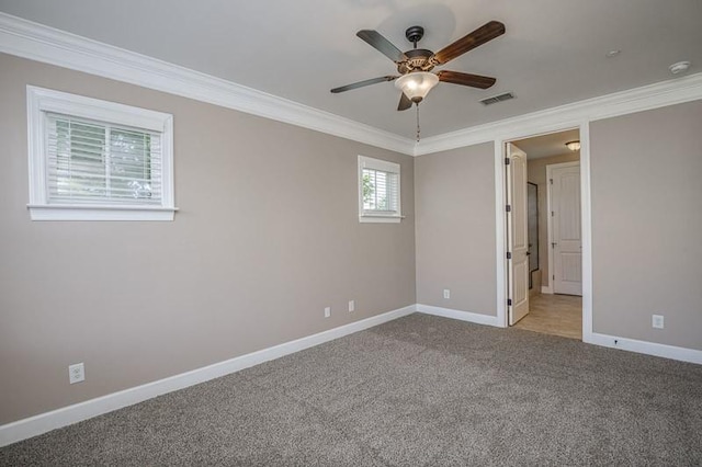 991 Westhaven Blvd Unit 32, Franklin, TN 37064 - unfurnished bedroom featuring ornamental molding, light colored carpet, and a ceiling fan